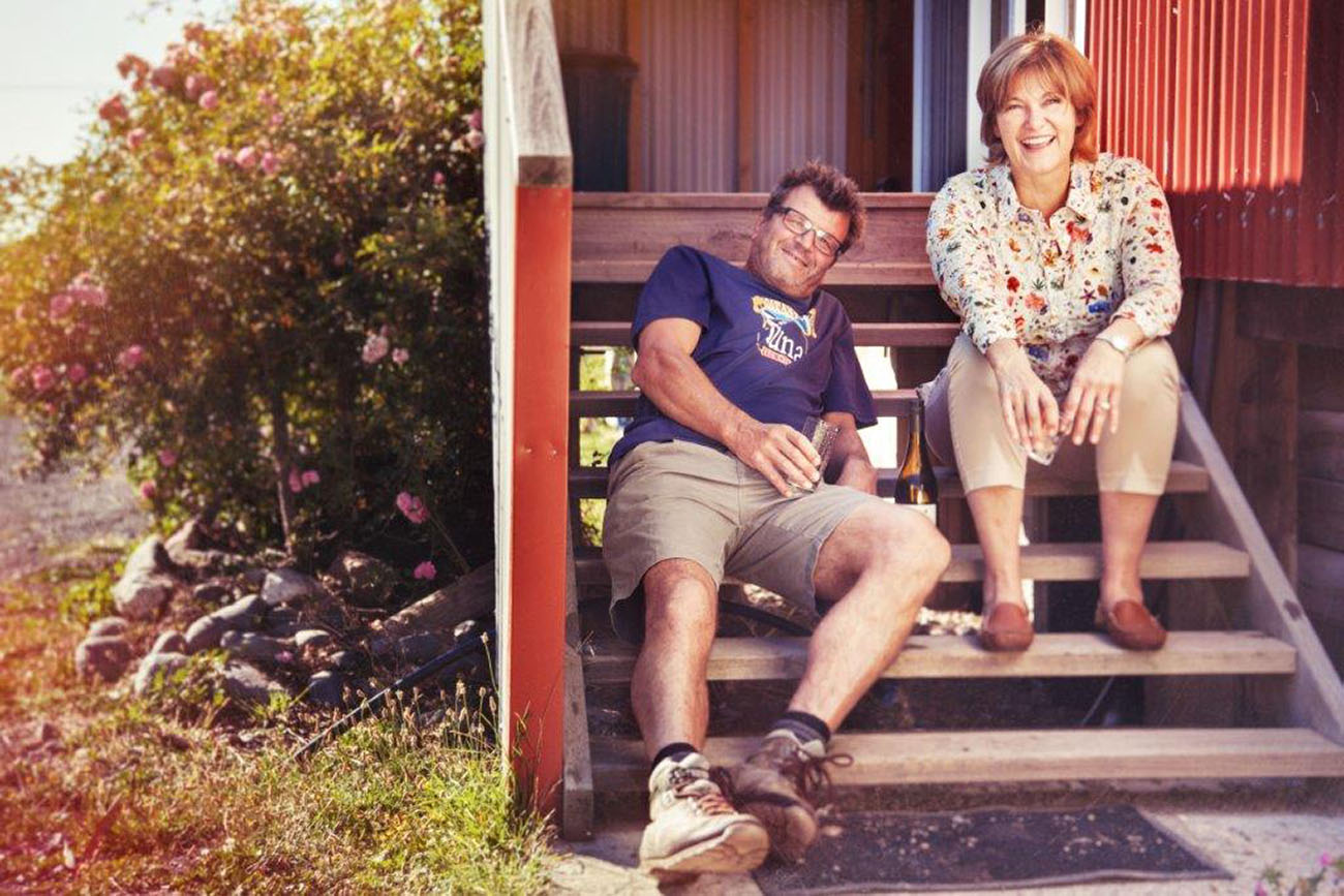 Kim and Eric Crawford from Loveblock wines sitting on some steps