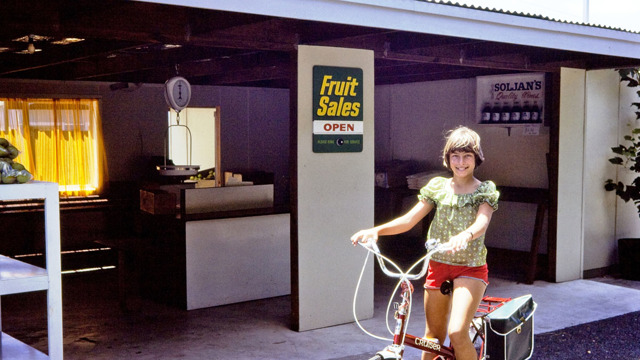 A young Tonia Soljian on a bicycle