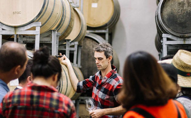 Dom Maxwell infront of a crowd