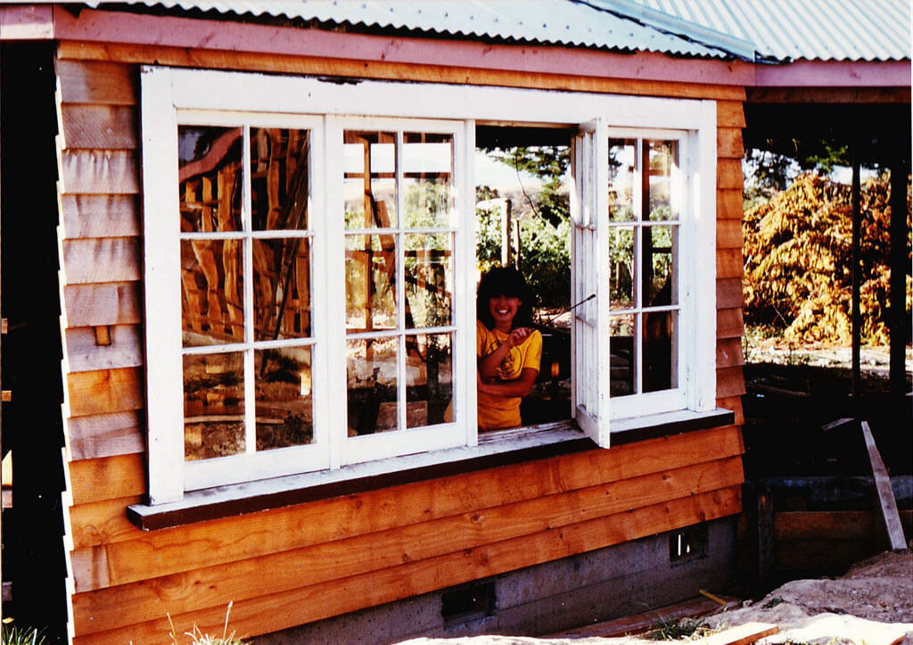 Judy Finn in window