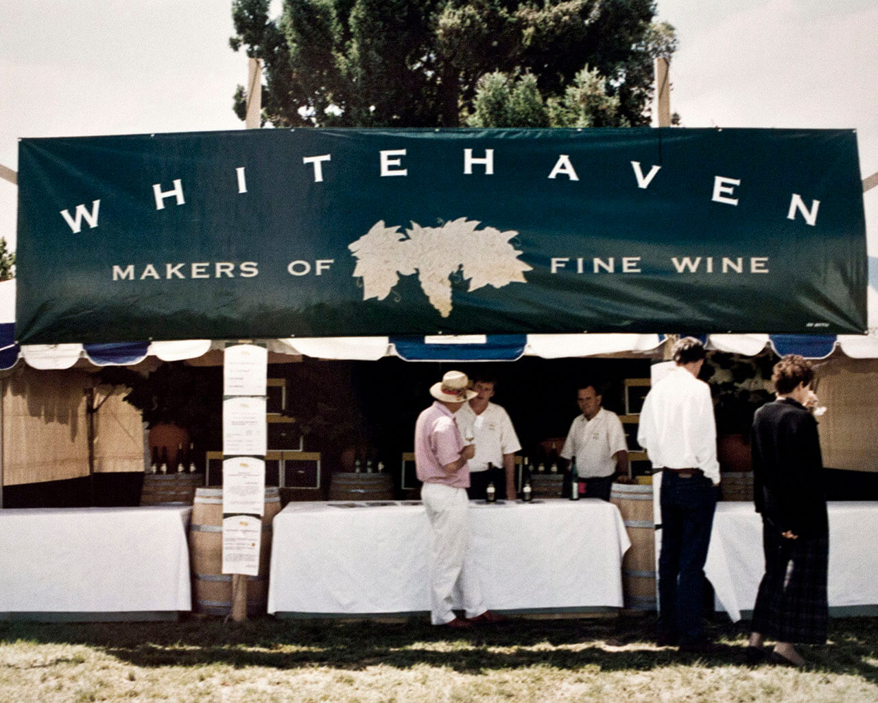 Whitehaven banner on a stall with people