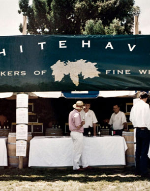 Whitehaven banner on a stall with people