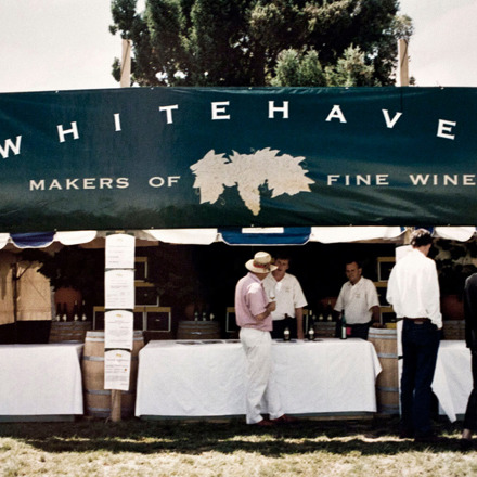 Whitehaven banner on a stall with people