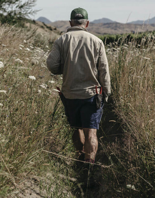 Man walking through Tohu Whenua Awa