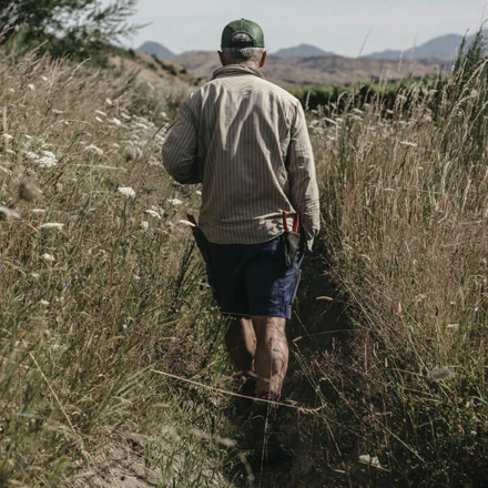 Man walking through Tohu Whenua Awa