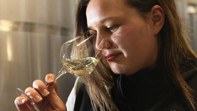 Emily Gaspard-Clark smelling wine