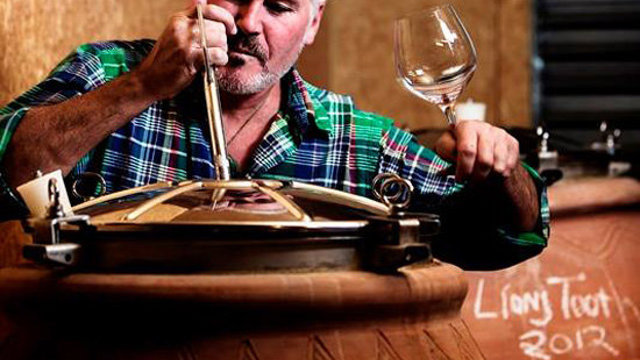 Mike Weersing sampling wine