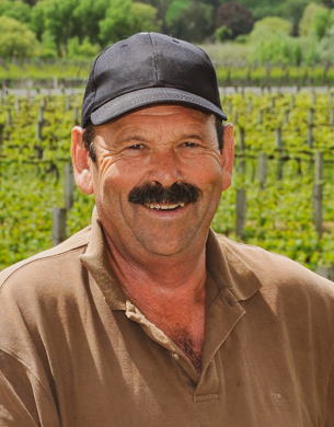 John Clarke in vineyard