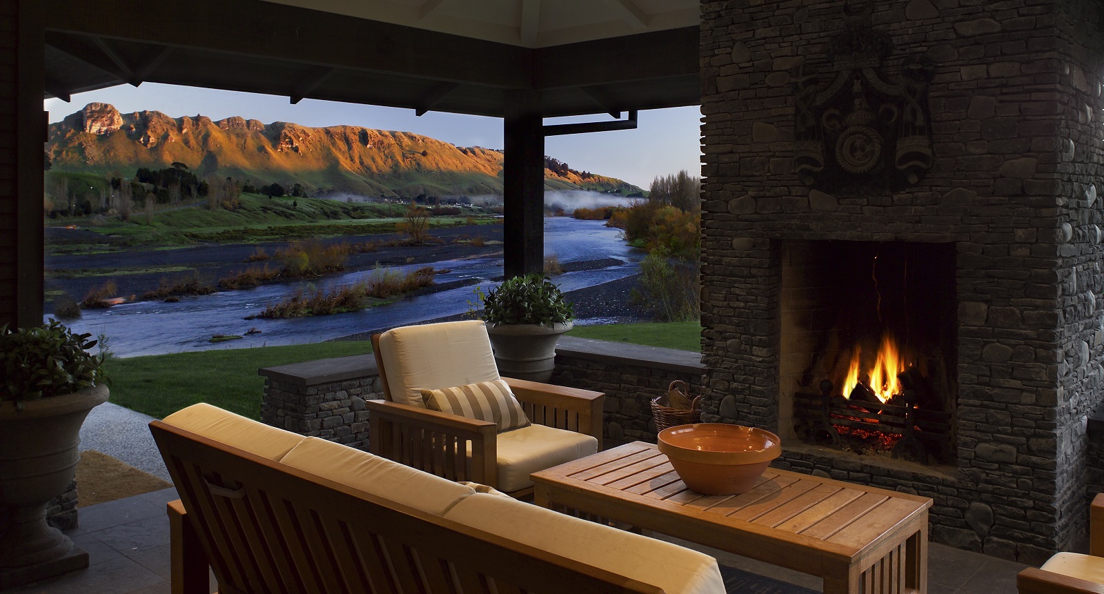 The fire place and interior of accommodation at Black Barn, Hawke's Bay.